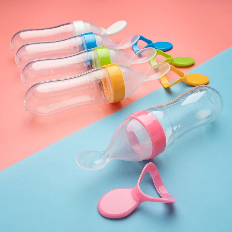 Baby Squeezing Feeding Spoon Bottle - Image 11